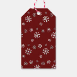 Sneeuwval op rode winter vakantie gift tag cadeaulabel