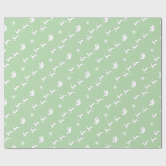 Sneeuwvlok en kerstman met slee op lichtgroen cadeaupapier (Vlak)