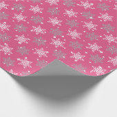 sneeuwvlokken en glinsterende hete roze kerst cadeaupapier (Hoek)