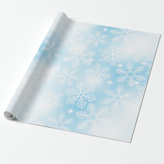 Sneeuwvlokken en lichten op blauw cadeaupapier (Uitgerold)