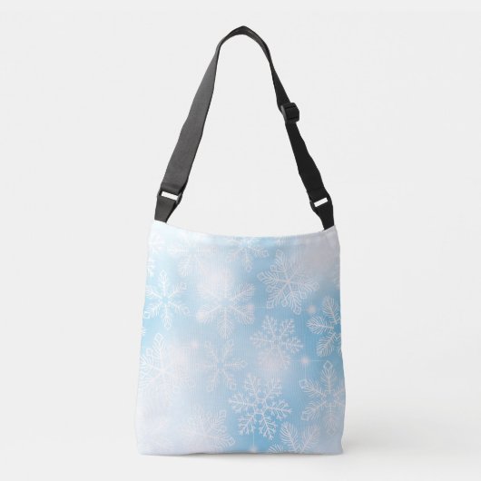 Sneeuwvlokken en lichten op blauw crossbody tas (Voorkant)