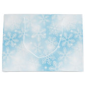 Sneeuwvlokken en lichten op blauw groot cadeauzakje (Voorkant)
