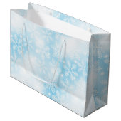 Sneeuwvlokken en lichten op blauw groot cadeauzakje (Voorkant Gekanteld)