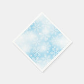 Sneeuwvlokken en lichten op blauw servet (Hoek)