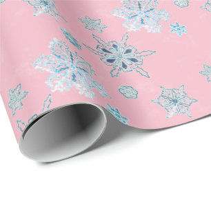Sneeuwvlokken in bleek roze cadeaupapier