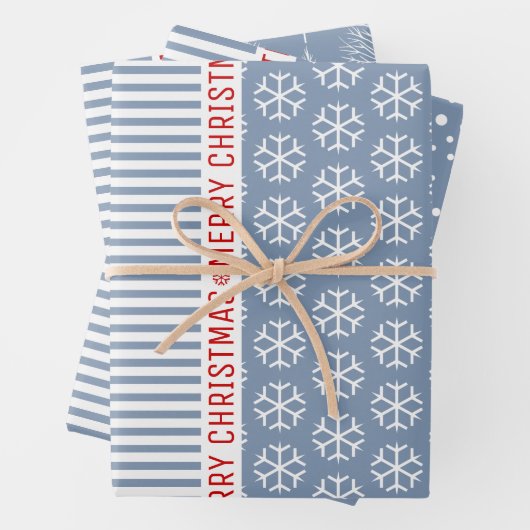 Sneeuwvlokken, kerstbomen en stoffige blauwe strep inpakpapier vel (In situ)