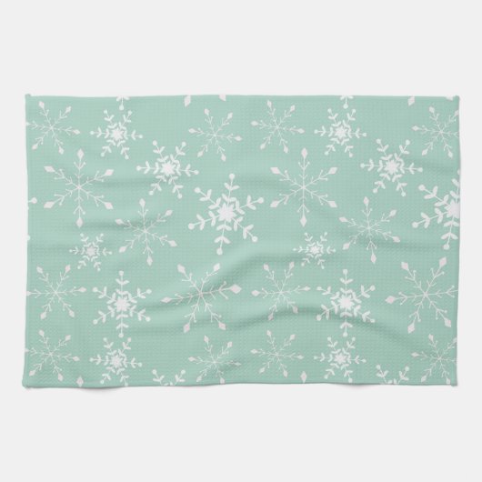 Sneeuwvlokken met een achtergrond van de groene ke theedoek (Horizontaal)