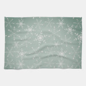 Sneeuwvlokken met een achtergrond van lichtgroen theedoek (Horizontaal)