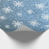 Sneeuwvlokken op blauw cadeaupapier (Hoek)