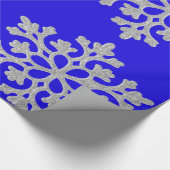 Sneeuwvlokken op blauw pakpapier (Hoek)