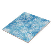 Sneeuwvlokken op blauw tegeltje (Zijkant)