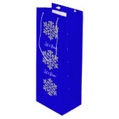 Sneeuwvlokken op blauwe cadeau wijn cadeautas (Voorkant Gekanteld)