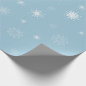 Sneeuwvlokken op Bleek blauw pakpapier (Hoek)