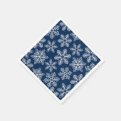 Sneeuwvlokken op donkerblauw servet (Hoek)