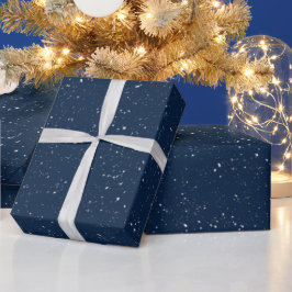 Sneeuwvlokken op een blauwe cadeaupapier