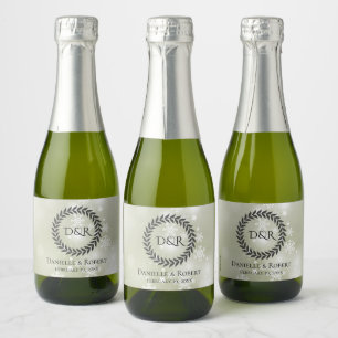 Sneeuwvlokken op licht saliegroene mini sparkling wijnetiket