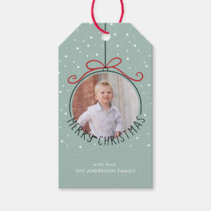 Sneeuwvlokken op pasteelgroen Kerstfeest met fot Cadeaulabel