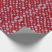  sneeuwvlokken op rood cadeaupapier (Hoek)