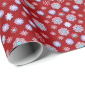  sneeuwvlokken op rood cadeaupapier (Rol Hoek)