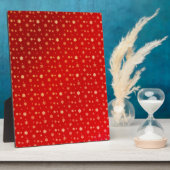 Sneeuwvlokken op rood fotoplaat (Zijkant)
