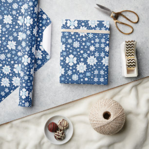 Sneeuwvlokken repeating patroon wit blauw cadeaupapier