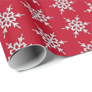 Sneeuwvlokken, zilverkristallen op donkerrood cadeaupapier