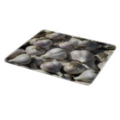 Snijplank van glas met oogst knoflook (Hoek)