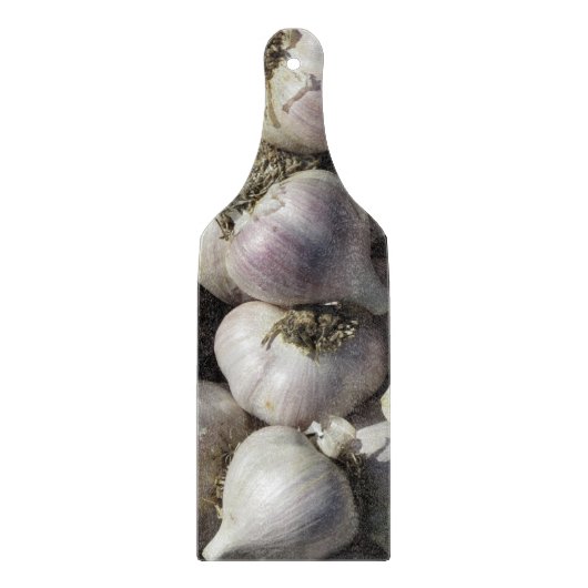 Snijplank van glas met oogst knoflook (Voorkant)