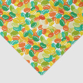 Snoep bonen geel veelkleurig op witte achtergrond tissuepapier (Detail)