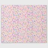 Snoep sprinken op roze cadeaupapier (Vlak)