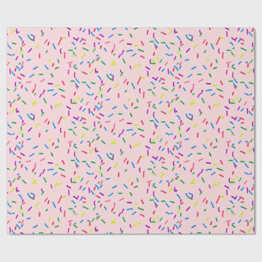 Snoep sprinken op roze cadeaupapier (Vlak)