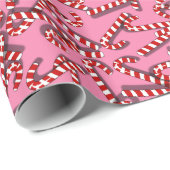 snoepjes op roze kerstpapier cadeaupapier (Rol Hoek)