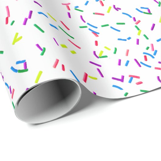Snoepjes sprinken op wit omslagpapier cadeaupapier (Rol Hoek)