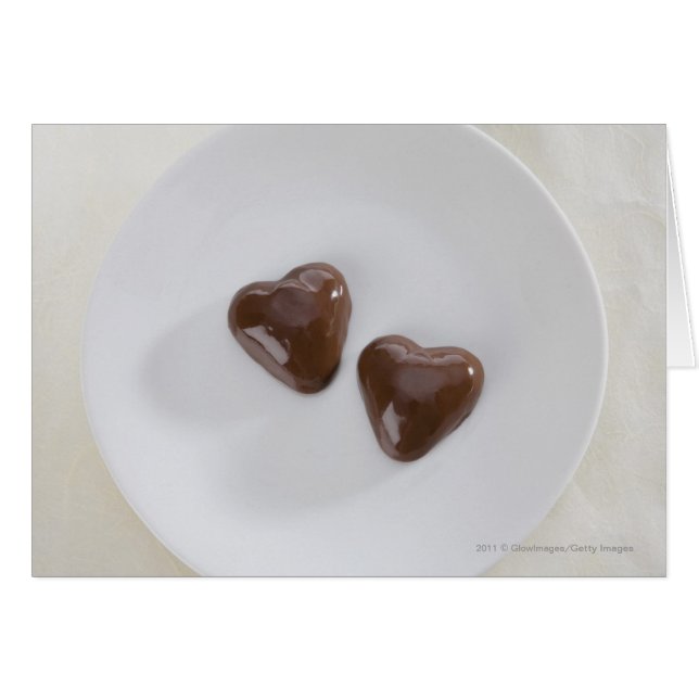Snoepjes van harsvormige chocolade op een bord (Voorkant Horizontaal)