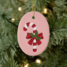 Snoepstokje Met Een Strik En Kersthulst Op Roze Keramisch Ornament