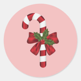 Snoepstokje Met Een Strik En Kersthulst Op Roze Ronde Sticker