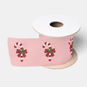 Snoepstokje Met Een Strik En Kersthulst Op Roze Satijnen Lint