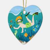 Snorkelende jongen onder het zee keramisch ornament (Links)