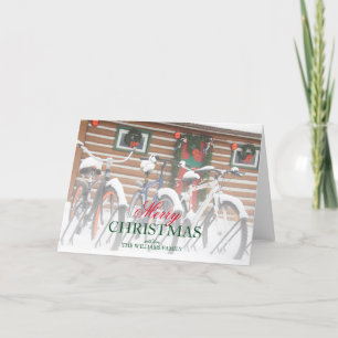 Snow-Covered Bicycles Near Festive Lodge Feestdagen Kaart