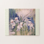 Snow Faeries Making Snow Legpuzzel<br><div class="desc">vintage fairylands painting of snow fairies making snow dressed in white fluffy hooded coats, pretty pink wings and fur lined trousers working and pushing snow covers sticks around a snow mill to churn and make snow. vintage illustrative watercolor fairyland painting of fairies on top of a mountain manufacturing snow by...</div>