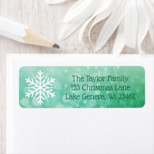 Snowflake-feestdag met groen kerstfeest etiket (Insitu)
