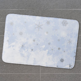Snowflakes voor smeltkroes op babyblauwe pastelkle badmat