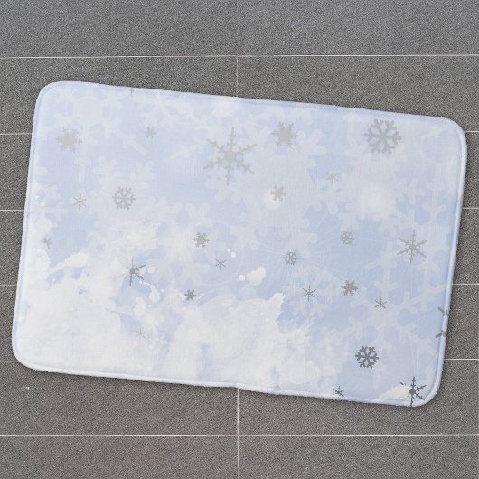 Snowflakes voor smeltkroes op babyblauwe pastelkle badmat