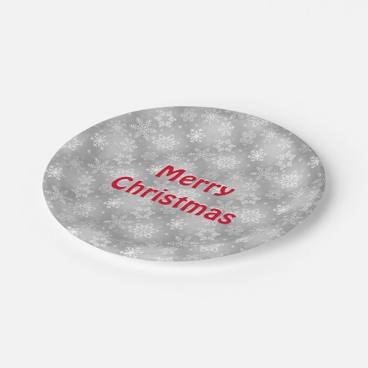 Snowflakes voor vrolijk kerstfeest op grijs papieren bordje (Gekanteld)