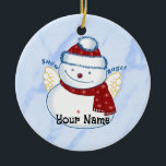 Snowman Angel Oval Ornament<br><div class="desc">Sneeuwman Angel Ovaal Keramisch Ornament,  T-shirts en geschenken van ArtMuvz Illustration. Bijpassende Funny Snowmen shirt,  multomap,  mok,  ornament. Om jouw namen toe te voegen te personaliseren of tekst toe te voegen. Pas dit sneeuwpop ornament aan om het uniek van u te maken of als een gepersonaliseerd cadeau te geven</div>