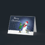 Snowman Building Feestdagen Kaart<br><div class="desc">De jongen heeft een sneeuwpop gebouwd waar zijn hond op staat en urineert terwijl de jongen de sneeuwman een wortelneus geeft.</div>