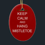 Snowman en Bird Ceramic Ornament<br><div class="desc">Dit mistletoe-afbeelding met de tekst "KALM BEHOUDEN EN HANG MISTLETOE" is perfect voor gebruik met kerst. Personaliseer door de kleur van het ornament en de tekst en tekstkleur te veranderen. Dit schattige ornament is perfect als cadeau voor vrienden en familie,  of koop er een voor jezelf.</div>