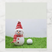 Snowman en golfbal op groene kerst met gras wijn etiket (Enkel label)
