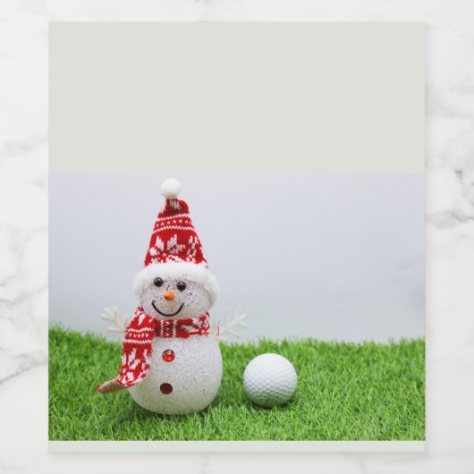 Snowman en golfbal op groene kerst met gras wijn etiket (Enkel label)