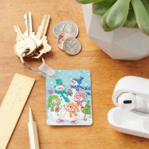 Snowman-familie in de sneeuw sleutelhanger